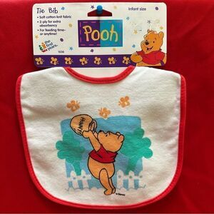 The first years Pooh Tie Bib infant